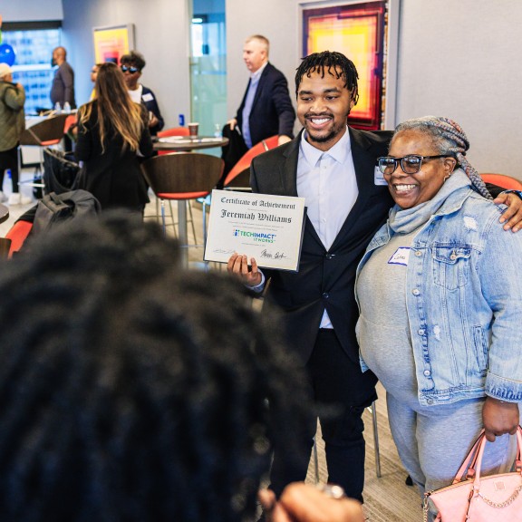 Graduate Taking Picture With Support Person