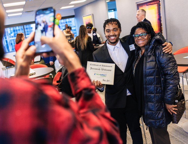 Graduate Taking Picture With Support Person